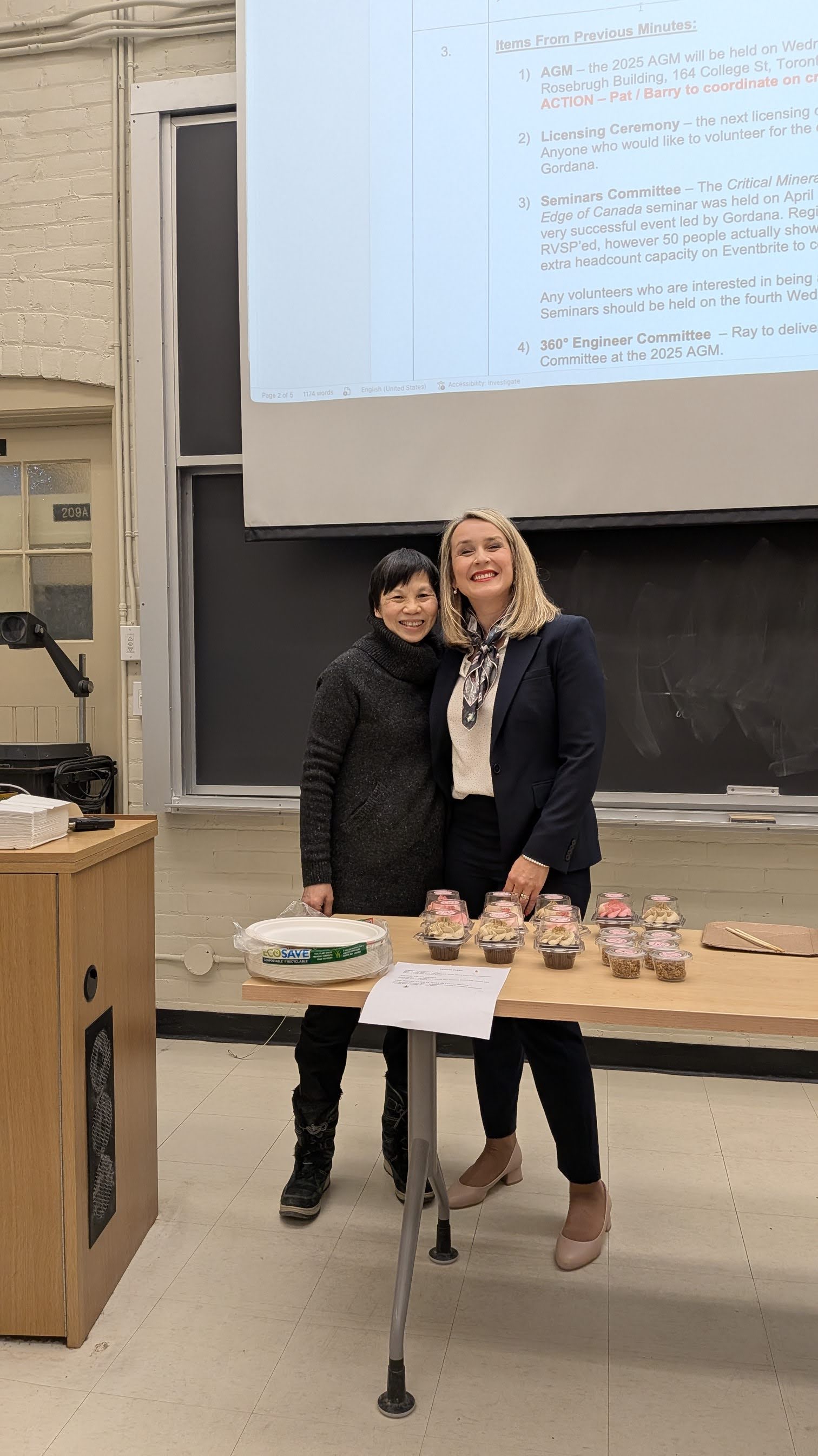 Pic 2. Past and Current Chairs of PEOWT Chapter Catharine Hancharek and Sanja Hulec preparing to hand in cupcakes for the volunteers and executive members