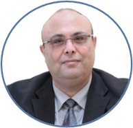 A person in a suit and tie Description automatically generated